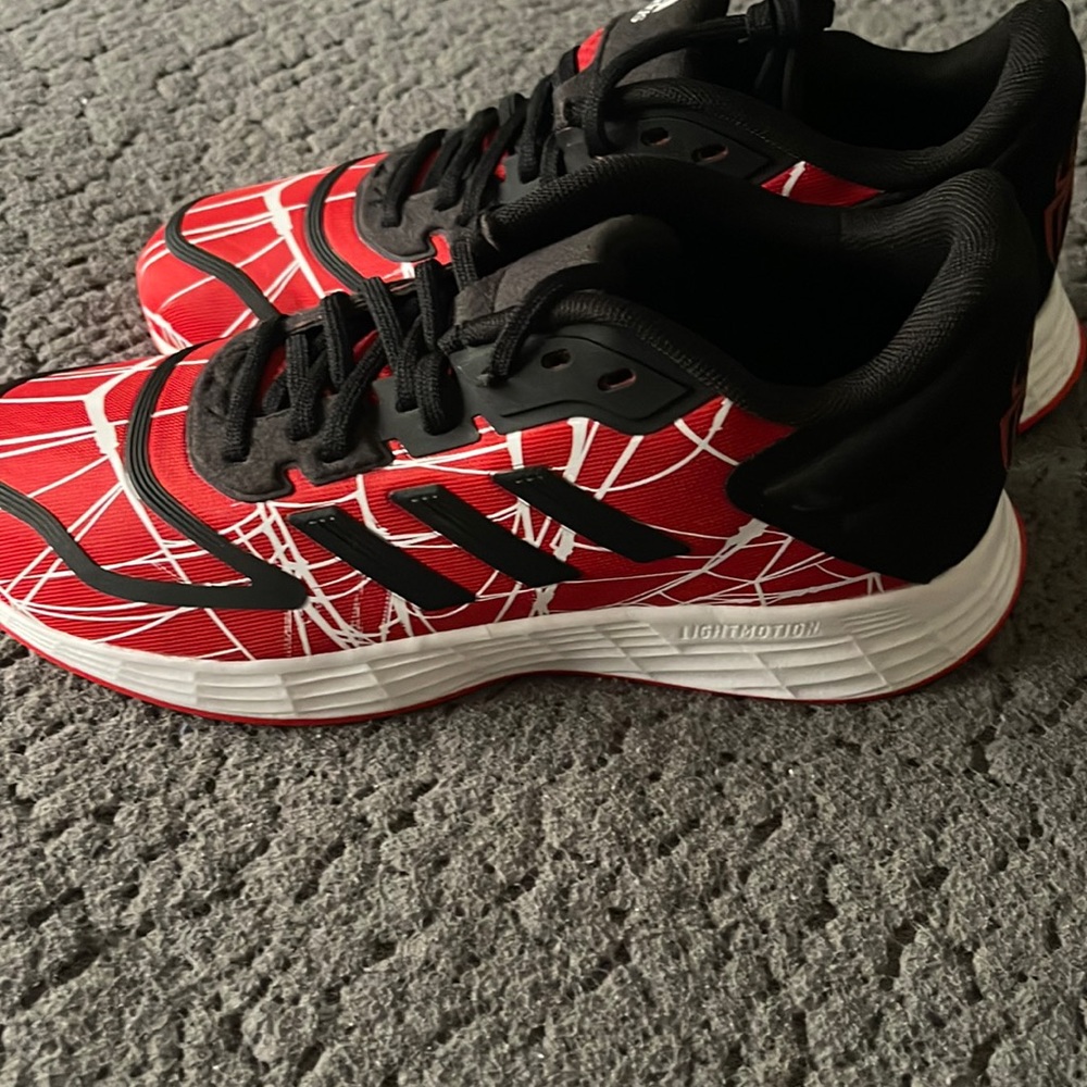 Kids adidas sneakers never worn
